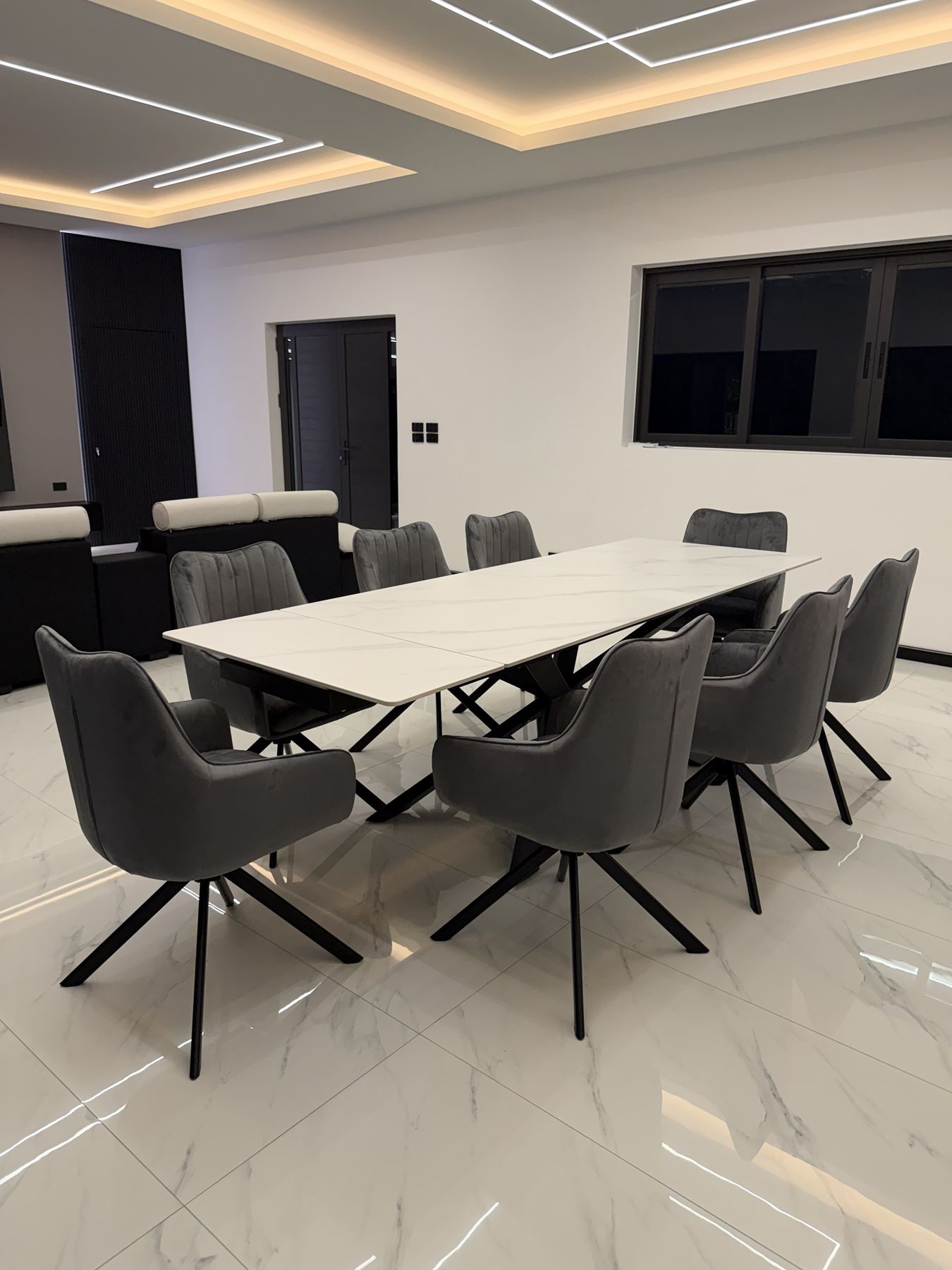 Dining table for eight under the LED ceiling