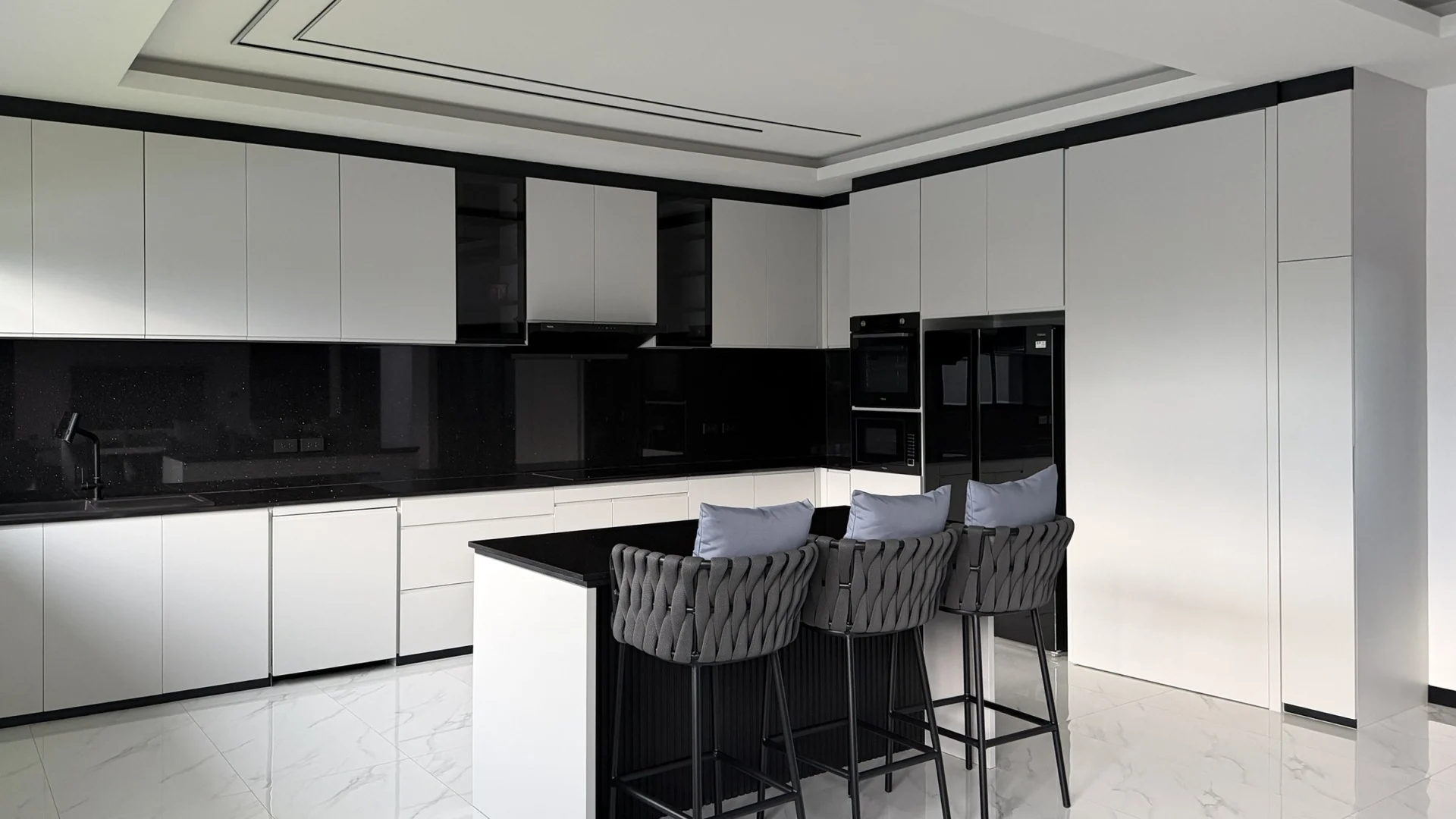 The kitchen by day with every cabinet closed